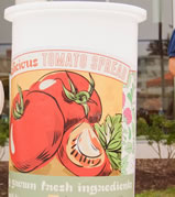 The World's Largest Jar of Tomato Spread, which is vegan, featured local produce, including more than 1,000 pounds of tomatoes from the on-campus Student Sustainable Farm. Other ingredients included peaches, beet sugar, local balsamic vinegar, and water. The Laregst Jar of Tomato Spread in the World contained 26,880 one-tablespoon servings.