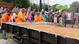 The cobbler weighed 2,902 pounds, breaking the previous Guinness world record of 2,251 pounds set by Ruston, La.